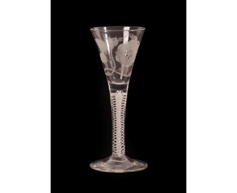 A Jacobite Wine Glass, circa 1750, the drawn trumpet bowl engraved with a rose with two buds and with a butterfly on a double