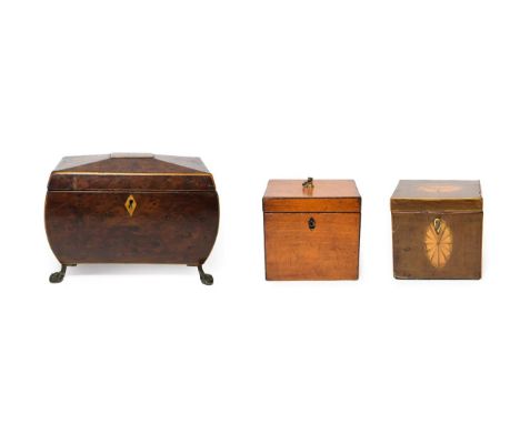 A Regency Metal Mounted Yewwood Tea Caddy, of bombé rectangular form, with two vacant compartments, on four paw feet, 21cm hi