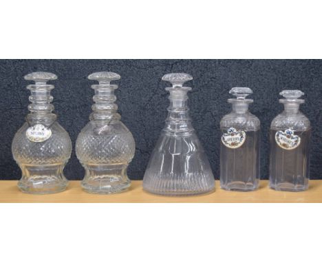 Pair of Georgian cut glass decanters&nbsp;with stoppers, 9.5" high; together with a pair of smaller square glass decanters an