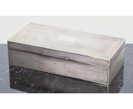 George V silver cigarette box, with engine turned decoration to the hinged cover and sides, with a lined wooden divided inter