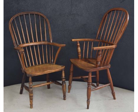 Two elm seat stick back Windsor armchairs,&nbsp;largest 21.5" wide, 18" deep, the seat 19" high, the back 40" high (2) 