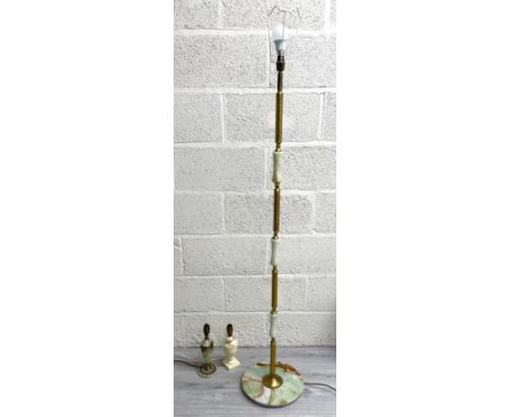 Onyx and gilt metal floor standing lamp, 57" high; together with a veined onyx table lamp and an Italian alabaster table lamp
