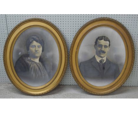 20th century&nbsp;- Portrait of a lady; together with a companion portrait of a gentleman, partially tinted photographs, oval