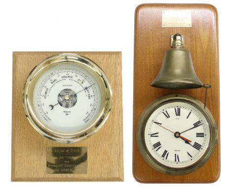 Contemporary electric ship's bulkhead wall clock with passing strike on a bell above,&nbsp;the 6" cream dial signed Nauticali