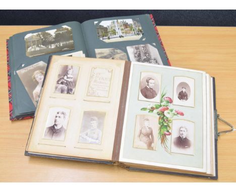 Leather bound photograph album containing interesting collection of old portrait photographs; together with a postcard album 