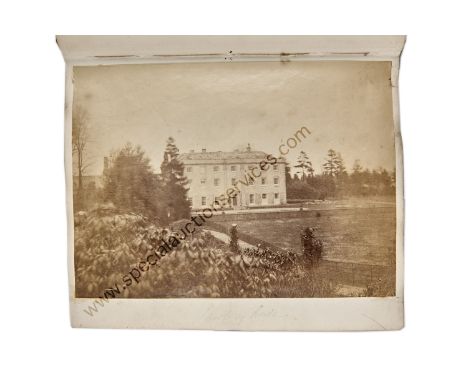 A Quarto Family Album of Photographs,  red morocco gilt, clasp, with elaborate manuscript gilt title to flyleaf 'Ellen Fawkes