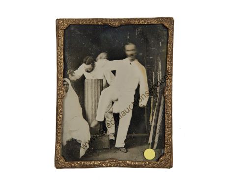 An Ambrotype Portrait of a Jig in the British Raj,  quarter-plate, a gentleman dancing in white lifts his right leg, seated t