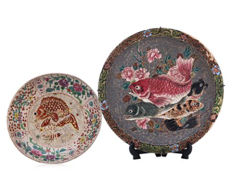 TWO JAPANESE CERAMIC DISHES
Late 19th-20th Century, comprising a pedestal bowl, decorated in overglaze enamels with a fish wi