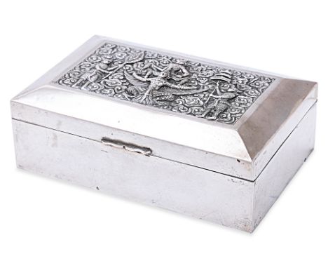 A THAI SILVER TABLE BOX
Chinese character marks, early 20th Century, rectangular, the hinged cover decorated in relief with V