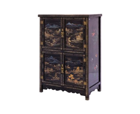 A BLACK LACQUERED CABINET
The set of doors decorated with pagodas in a landscape scene, the sides and top decorated with bird
