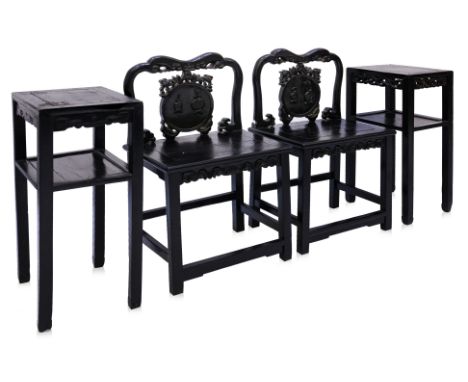 A PAIR OF BLACKWOOD CHAIRS AND TWO TABLES
Chinese, the chairs with curved back and circular panel decorated with precious obj