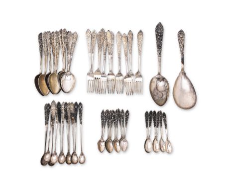 AN ASSEMBLED PART SERVICE OF INDONESIAN SILVER CUTLERY
Various makers, 800 standard, 20th C., all with lotus and scrolling fo