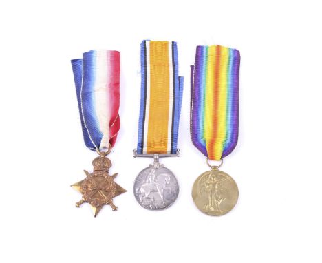 A British Army WWI medal trio. Comprising 1914 'Mons' Star with clasp for 1914-1915, a War Medal and Victory Medal, all named