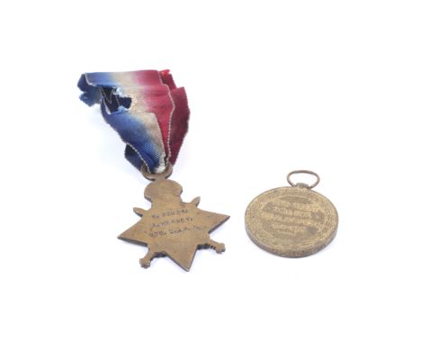 A pair of WWI medals. Comprising the Mons Star on ribbon (K.23924 A. Kersey, Sto. 2. R.N.), and the Victory Medal (K.23924 A.