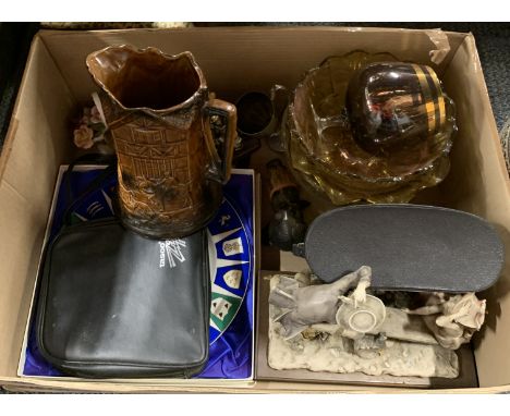 A group of mixed ceramic and other items.