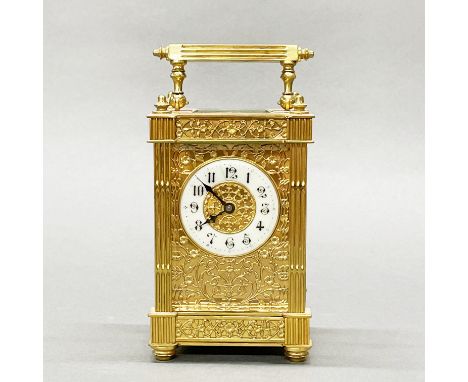 An ornate gilt brass carriage clock, H. 15cm.