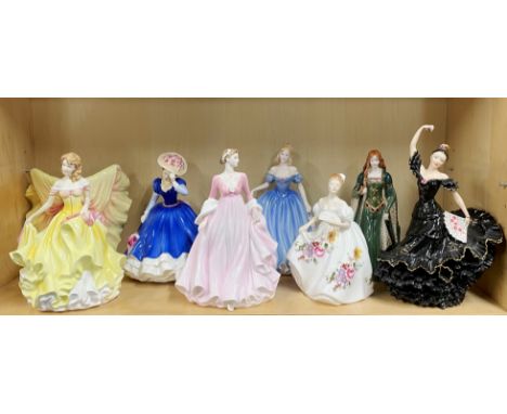 A group of eight Royal Worcester, Coalport and Doulton figurines.