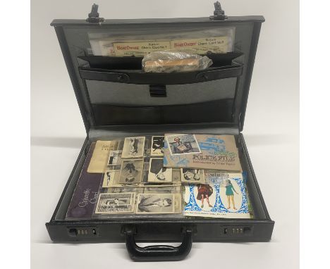 A case of cigarette and other collectors cards.
