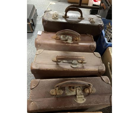 A group of four vintage cases, largest. 40 x 30 x 15cm.