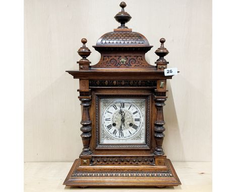 A 19thC mahogany mantel clock, H. 59cm.