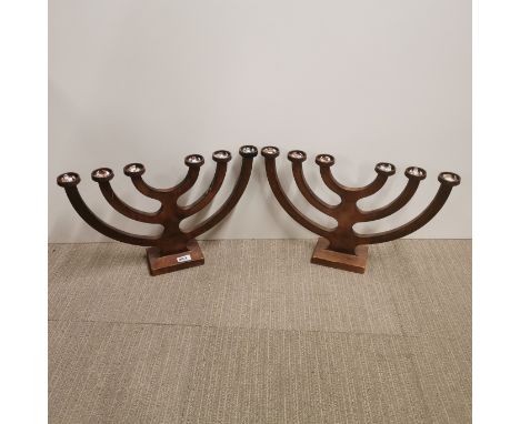 A pair of wood laminate vintage candle holders, W. 51cm.
