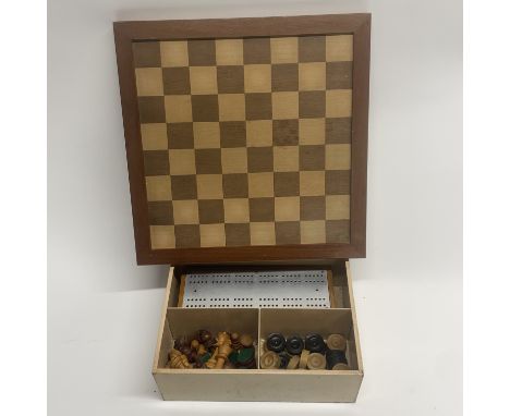 A wooden chess set, board etc, king H. 7cm.