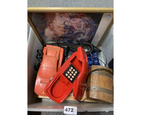 Two vintage racing car telephones and other items.
