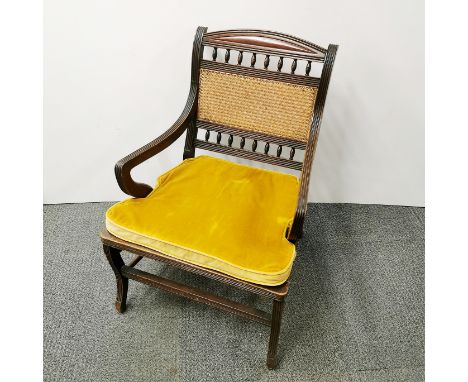 A vintage wicker and carved mahogany hall chair, H. 75cm.