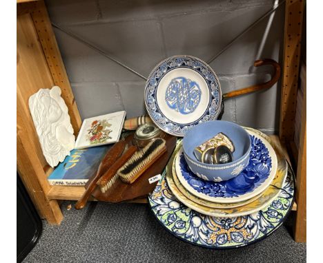 A group of ceramic and other items.