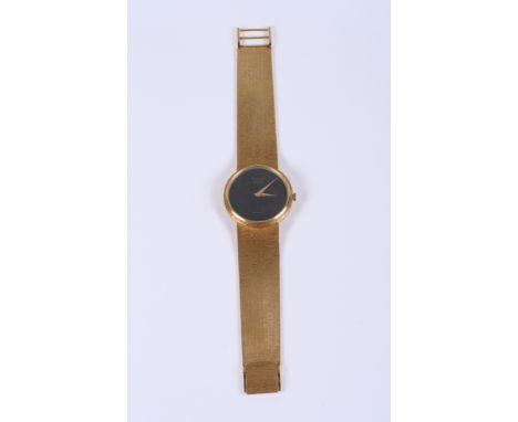 An 18ct gold Chopard Geneve wristwatch with "tortoise shell" dial and automatic movement, on textured strap and clasp 78.3 gr