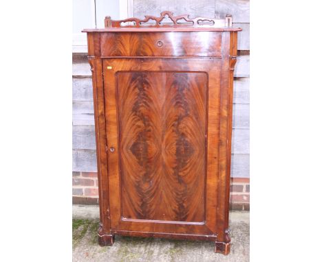 A 19th century Continental walnut side cabinet with pierced gallery over one drawer and one door, on splay bracket feet, 34" 