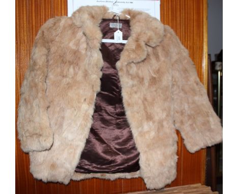A coney fur jacket, back 28" long