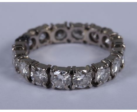 An 18ct white gold and diamond full eternity ring set fifteen brilliant cut stones, stones 0.25ct approx each