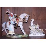 A Continental porcelain figure of a cavalry man and a serving maid, 12" high, a Dresden group, Venus