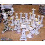 A Continental porcelain five-branch candelabrum with encrusted floral decoration, together with a