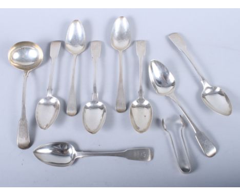 A matched set of eight Georgian silver dessert spoons, a Georgian silver sauce ladle and a pair of silver sugar tongs, 11oz t