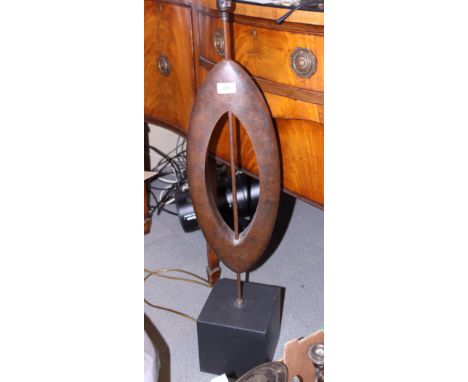 A modern copper free form table lamp, on cube base, 38" high
