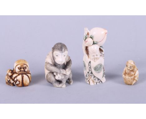 A carved netsuke of a monkey and young, 2" high, and three others