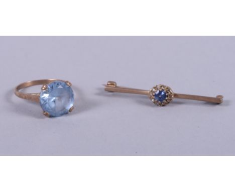 A 9ct gold ring set aquamarine coloured stone, size K, and a similar bar brooch