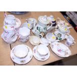 A Belleek miniature teacup, a similar sugar bowl, a Shelley part tea service, a Hammersley part