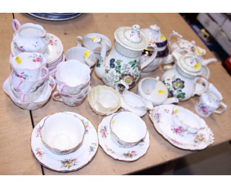 A Belleek miniature teacup, a similar sugar bowl, a Shelley part tea service, a Hammersley part tea service and other decorat