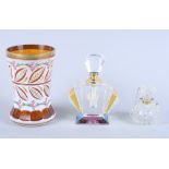 An early 20th century enamelled and gilt faceted Bohemian glass waisted beaker, 5 1/4" high, an