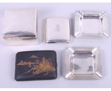 A pair of 1950s silver square ashtrays with engine turned decoration, a silver cigarette box, a silver cigarette case and a s