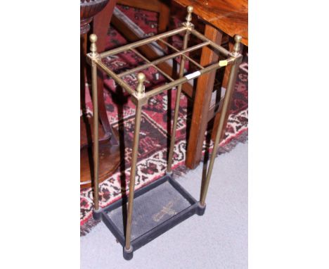 A brass and cast iron six-division stick stand