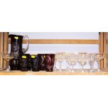 A Bohemian ruby flashed glass lemonade jug, 8 1/2" high, with five matching glasses and a collection