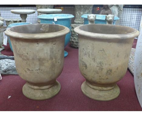 Two large terracotta Provence urn style planters, H.68cm Diameter 60cm 