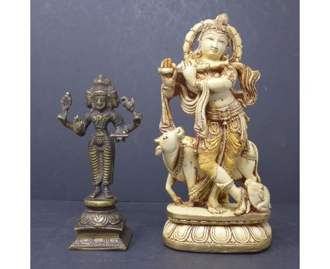 A bronze statue of Hindu deity Brahma, H.16cm, together with a moulded statue of Krishna, H.21cm 