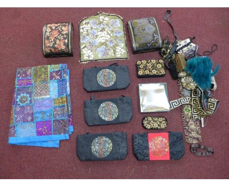 A collection of sequin and bead sash belts together with a group of items covered in beads 