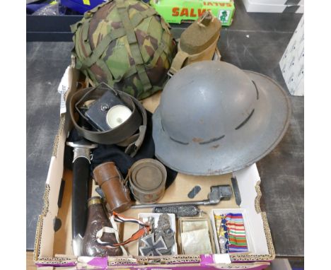 Militaria - helmets, replica German dagger, medals etc.  This bladed product is not for sale to people under the age of 18.  