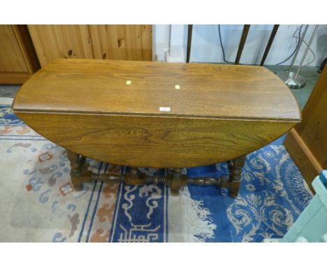 Ercol gate leg coffee table, height 49 cm, width with flaps down 42 cm, each flap 26 cm, length 106 cm